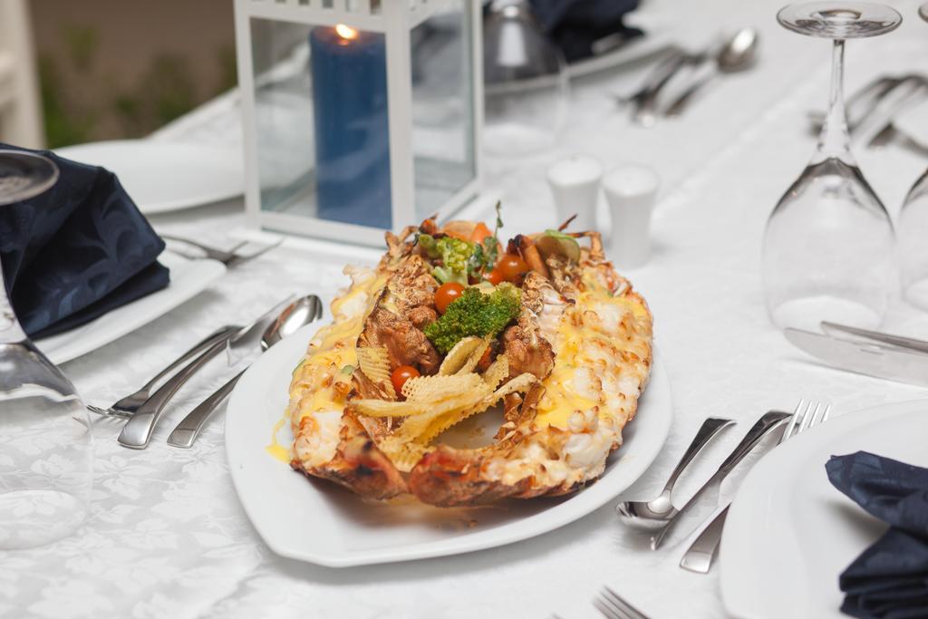 Rixos Alamein - Full Board Plus El Alamein Exteriör bild A lobster prepared in the New England style