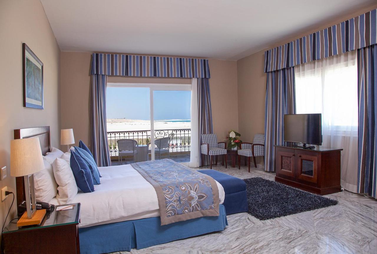 Rixos Alamein - Full Board Plus El Alamein Exteriör bild A bedroom at the Hilton Sharm El Sheikh